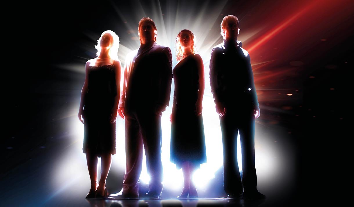 Four members of Beyond Barricade backlit