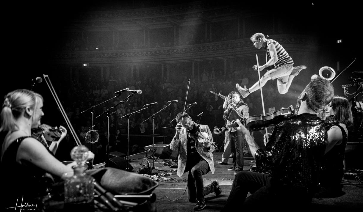 Photo of Bellowhead performing on stage