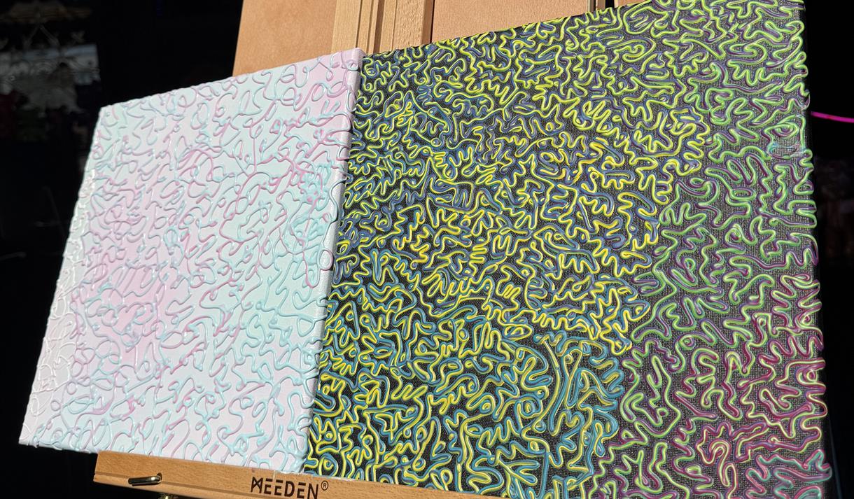 Artwork displayed on an eisel