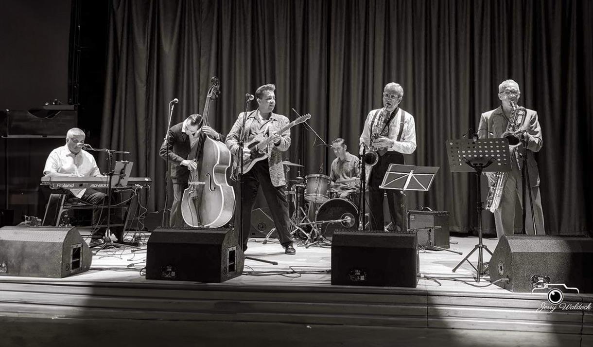 Black and white photo of King Joe & The Atlantics