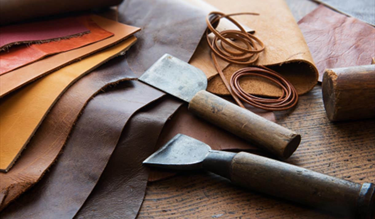 tan coloured leather and tools