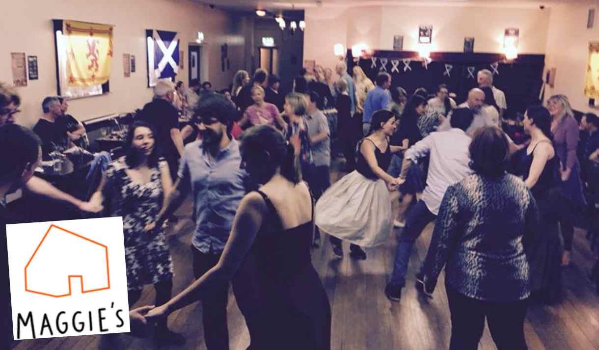 Photo of a crowd dancing at a ceilidh