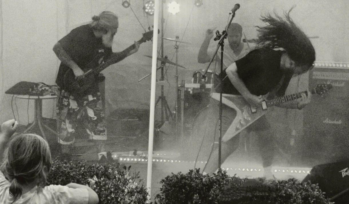 Black and white image of two electric guitarists on stage