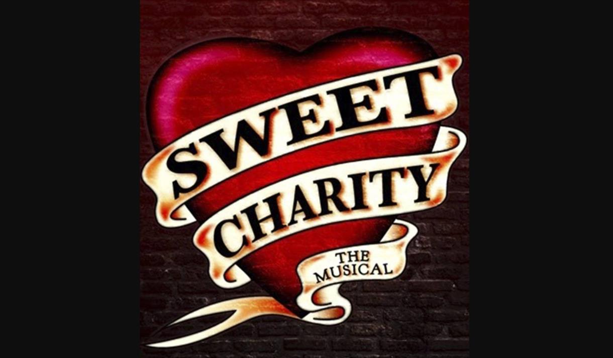 Sweet Charity banner wrapped around archetypal graphic of heart