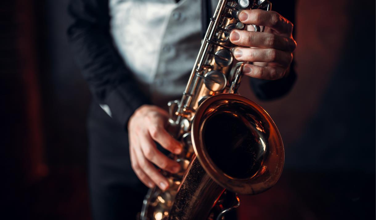 Photo of a person playing a saxaphone