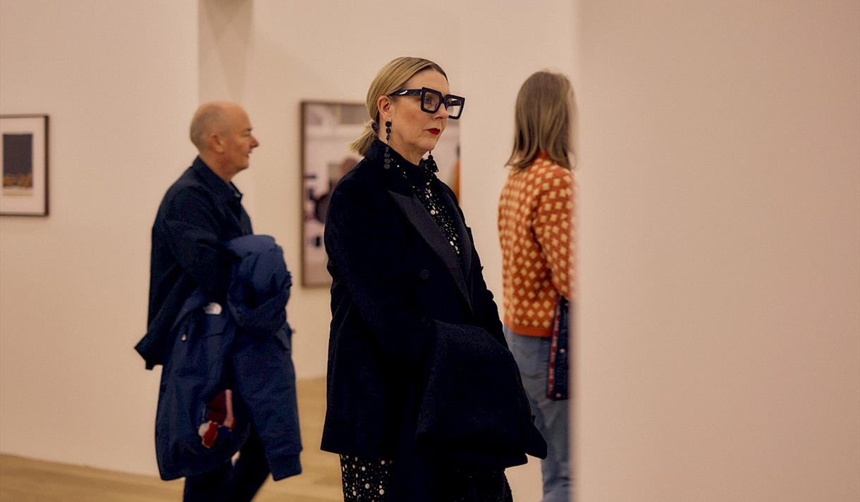 Photo of visitors in the gallery space