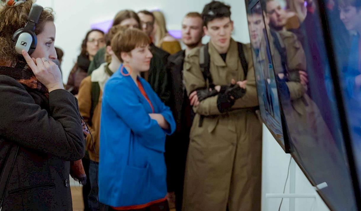 Photo of participants on a gallery walkthrough