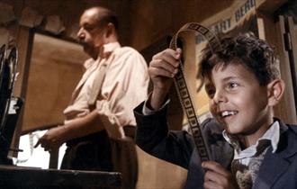 imagine of a young man with a film script