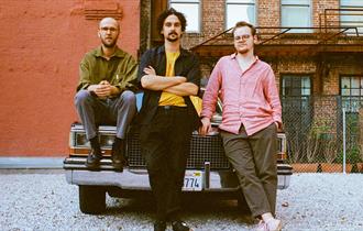 the three members of the band