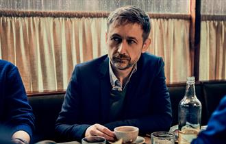 Image of the man behind the album - the divine comedy