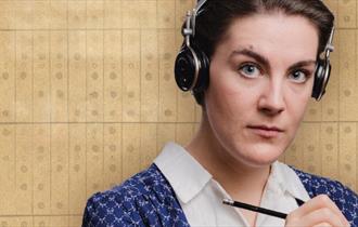 image of a woman with headphones