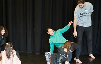 children performing movements