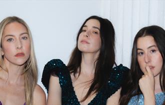 the three members of the band Haim