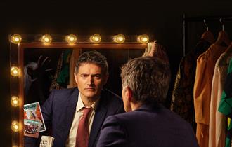 guy looking in the mirror