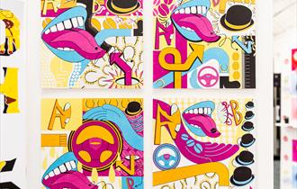 Graphic design work with arrows, mouths and bright colours