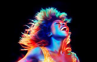 Image of Tina Turner singing