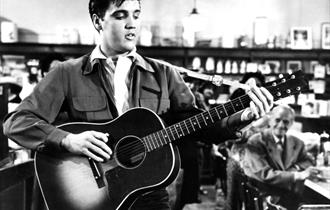 Black and white photo of Elvis in 'King Creole'