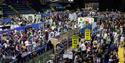 A photo of the arena bowl showing a large crowd and stalls