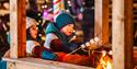 Children roasting marshmallows