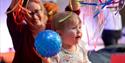 Photo of a young child engaging in sensory play