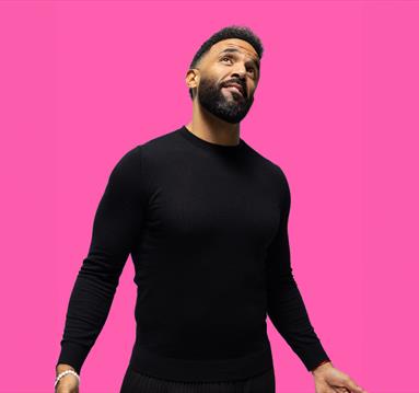 Photo of Craig David against a pink background