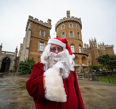 Father Christmas in front of Belvoir Castle.