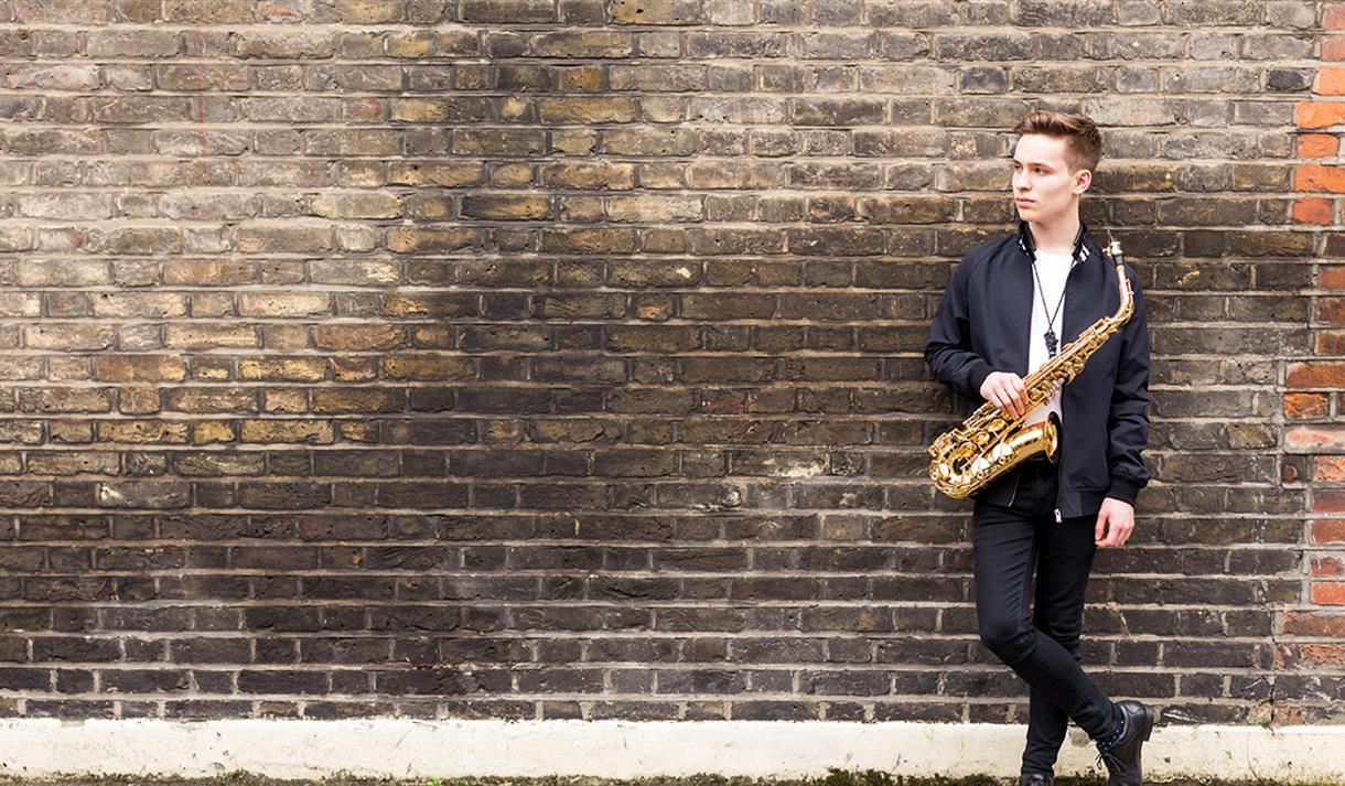 Musician with saxophone | Visit Nottinghamshire