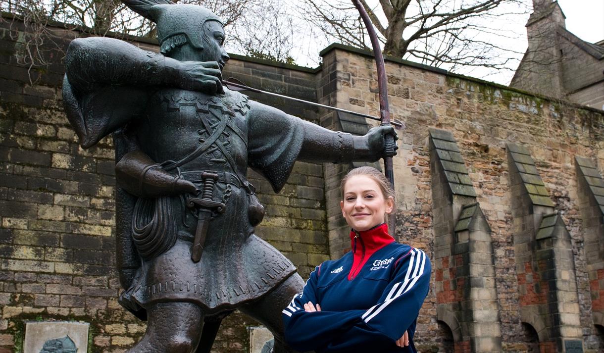 Trampoline and Tumble athlete Bryony Page next to Nottingham's famous Robin Hood statue