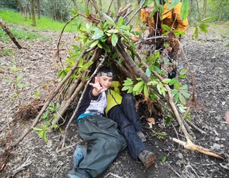 two kids in a den