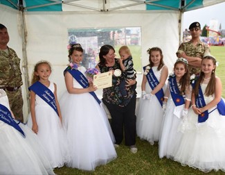 THe carnival queen and her attendants