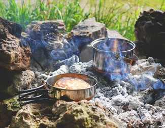 cooking over an open fire
