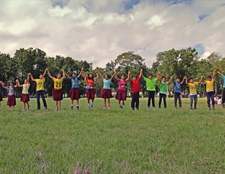 Line of kids jumping in the air