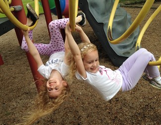 children playing on a climbing frame