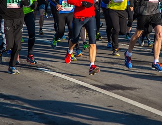 image of lots of running feet and legs