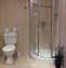 Bathroom with shower unit.