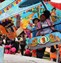 child on a fairground ride