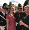 2 couple dressed in 1940's wartime costumes