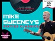 Mike Sweeney holding guitar