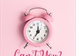 image of an pink analog alarm clock
