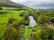 drone shot of pods at dovestone holiday park