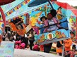 child on a fairground ride