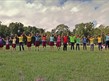 Line of kids jumping in the air