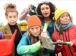 four ladies with gardening equipment