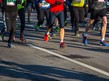 image of lots of running feet and legs