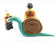 Plasticine snail and lego figures