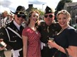 2 couple dressed in 1940's wartime costumes
