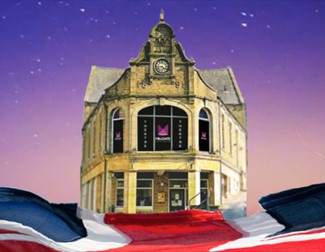 Image of Millgate Arts Centre with the Union Jack flag