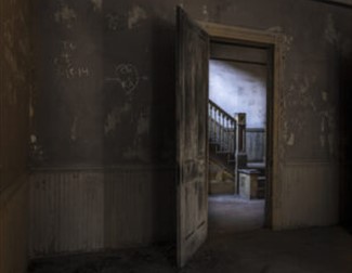 Doorway from a darkened room