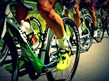images of bike wheels and cyclists legs