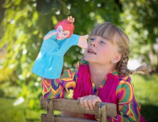 child with puppet